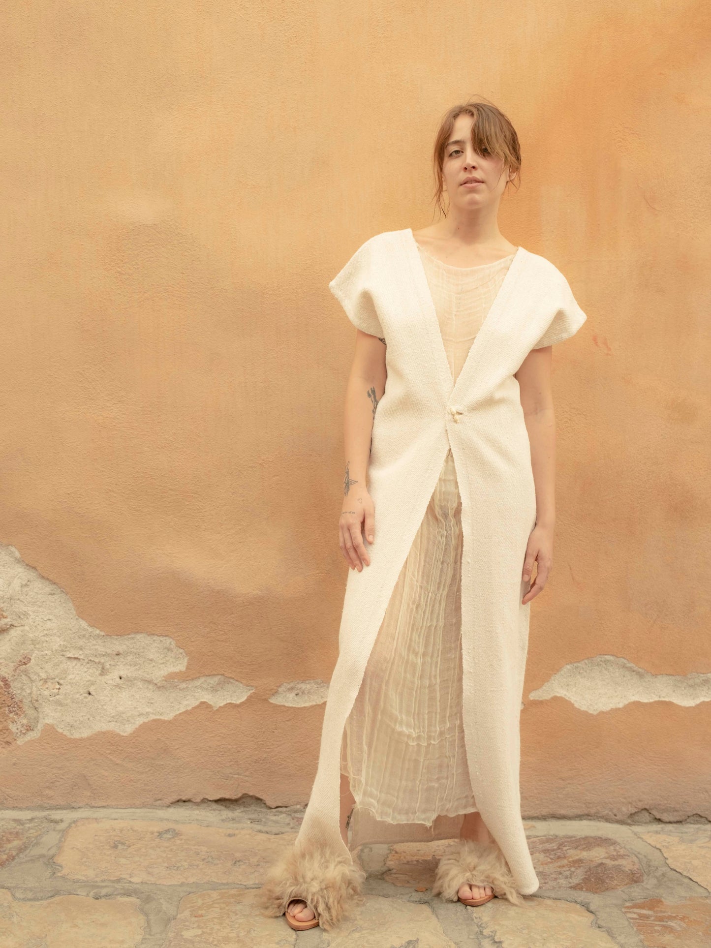 Chaleco largo de jerga unido a mano