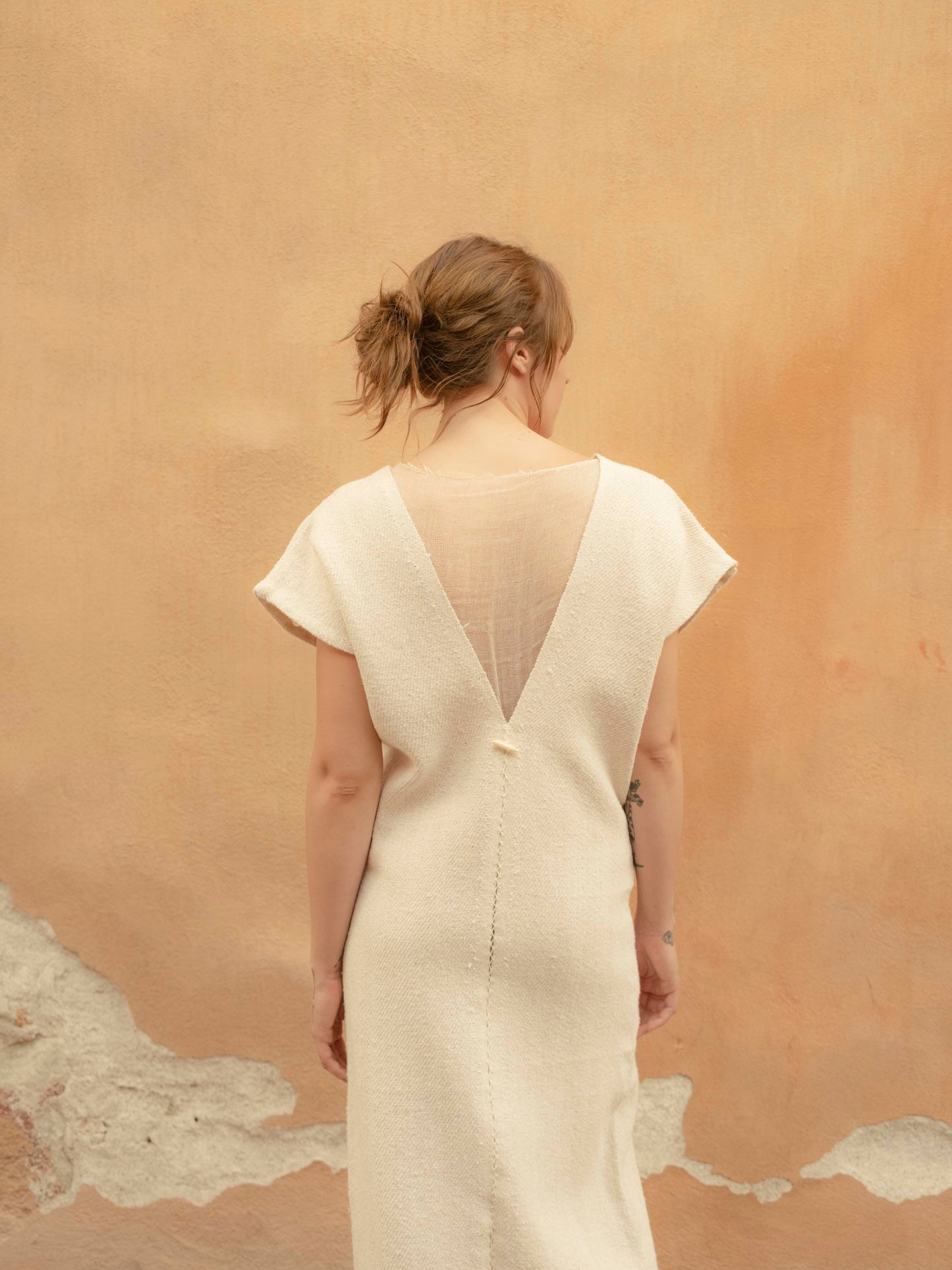 Chaleco largo de jerga unido a mano