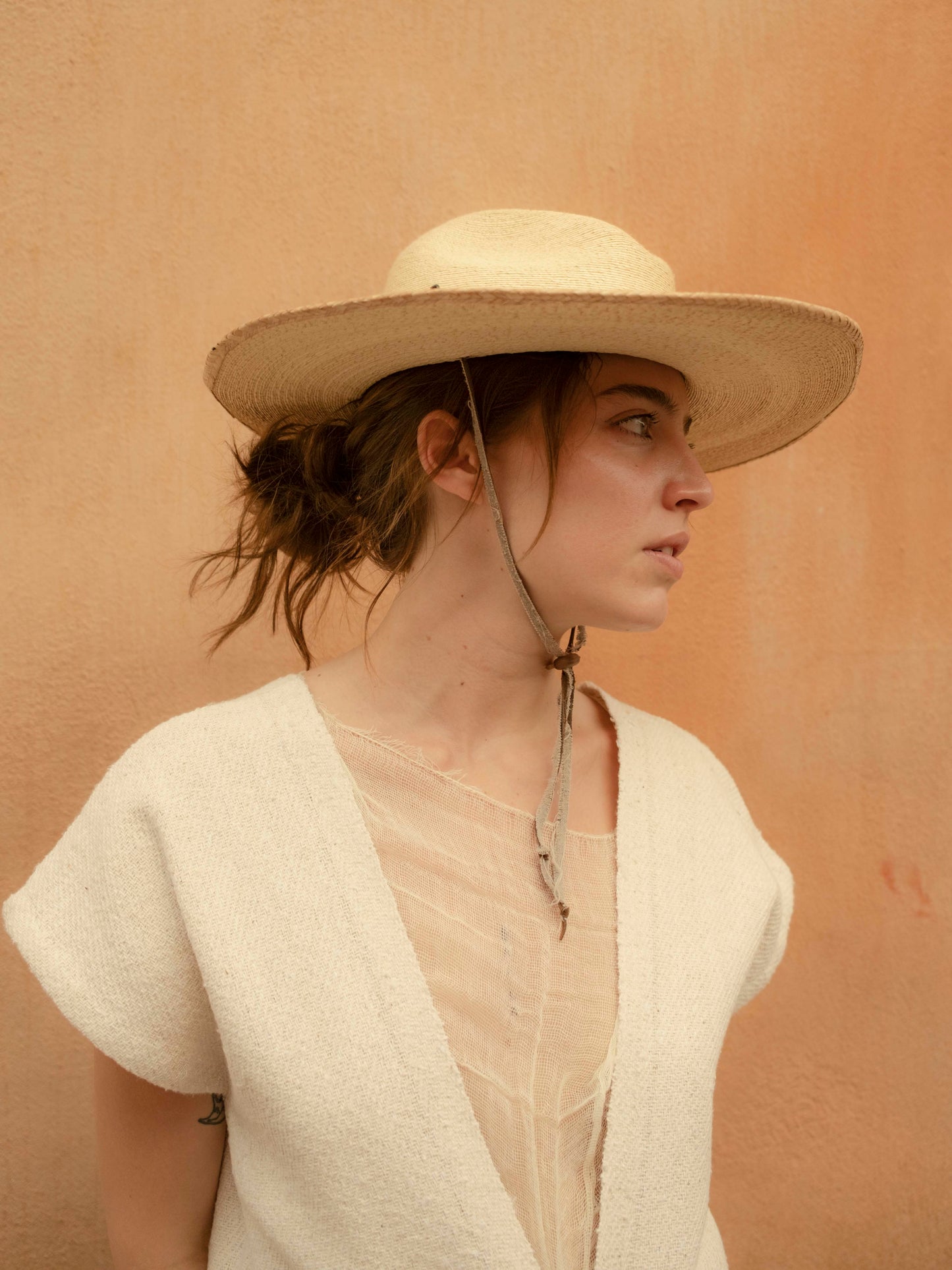 Chaleco largo de jerga unido a mano