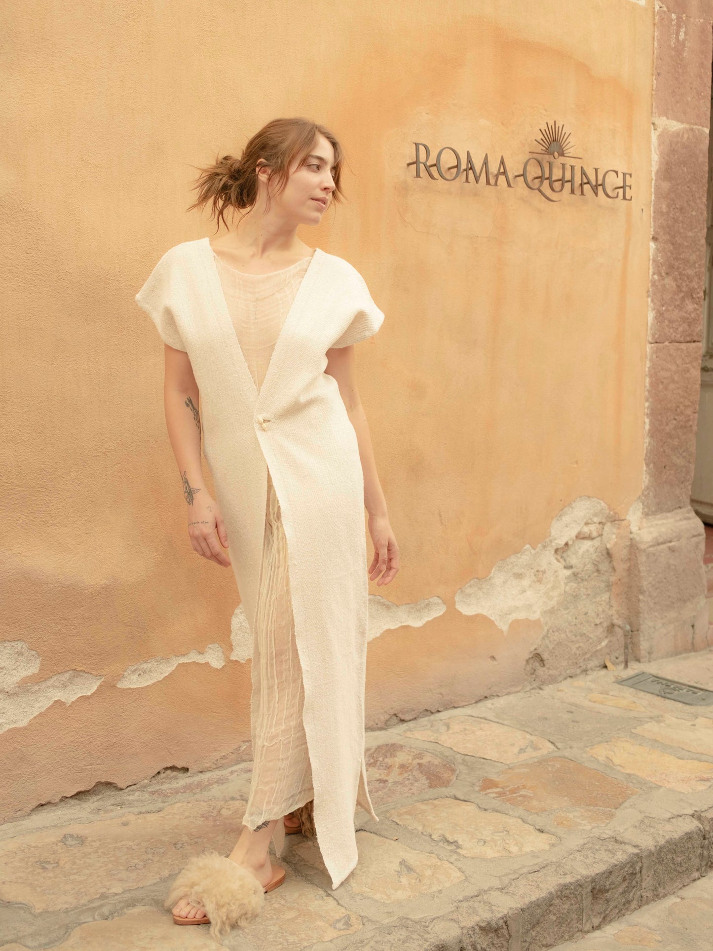 Chaleco largo de jerga unido a mano